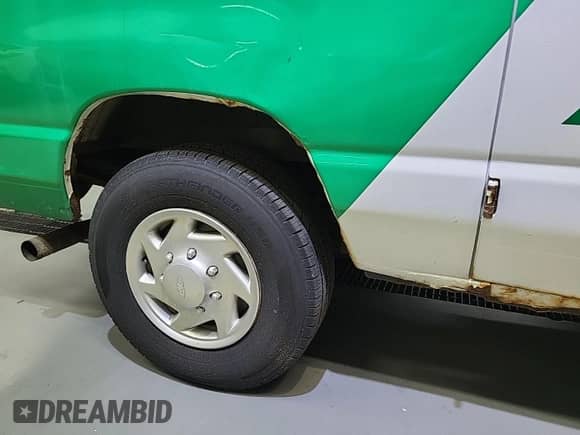 2011 Ford Econoline Cargo Commercial with VIN 1FTNE2EL4BDA70943, listed as a IAAI auction lot 43552276 with 141,096 mi miles and . Bid and sale history available at DreamBid. Image 22.