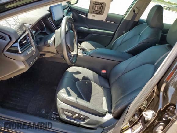 2021 Toyota Camry XSE with VIN 4T1K61AK9MU402834, listed as a Copart auction lot 71657335 with 77,028 mi miles and Salvage title. Bid and sale history available at DreamBid. Image 7.