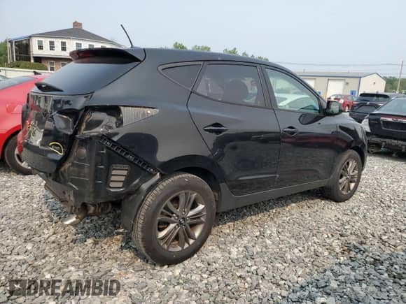 2014 Hyundai Tucson GLS with VIN KM8JTCAFXEU854618, listed as a Copart auction lot 67341115 with 129,690 mi miles and Clean title. Bid and sale history available at DreamBid. Image 3.