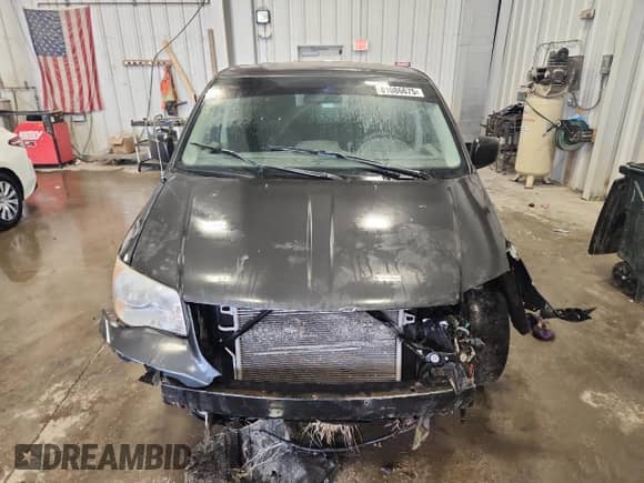 2012 Dodge Grand Caravan SE with VIN 2C4RDGBG8CR360660, listed as a Copart auction lot 81086675 with 185,478 mi miles and Non repairable. Bid and sale history available at DreamBid. Image 5.