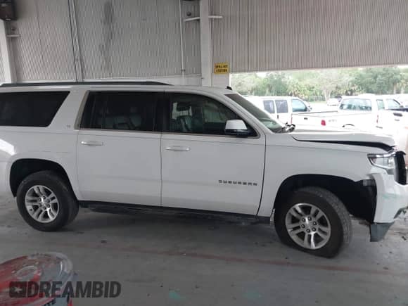2015 Chevrolet Suburban LT with VIN 1GNSCJKC0FR104562, listed as a IAAI auction lot 42806992 with 178,433 mi miles and . Bid and sale history available at DreamBid. Image 14.