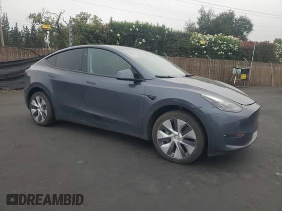 2023 Tesla Model Y Long Range z VIN 7SAYGDEE2PF828057, wystawiony jako Copart lot #68909315 z przebiegiem 22 317 mil mil oraz Szkoda całkowita • Salvage title. Historia ofert i sprzedaży dostępna na DreamBid. Obrazek 4.
