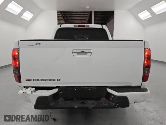2012 Chevrolet Colorado 1LT z VIN 1GCDSCFE9C8131255, wystawiony jako Copart lot #66291275 z przebiegiem 149 344 mil mil oraz Czysty tytuł • Clean title. Historia ofert i sprzedaży dostępna na DreamBid. Obrazek 6.