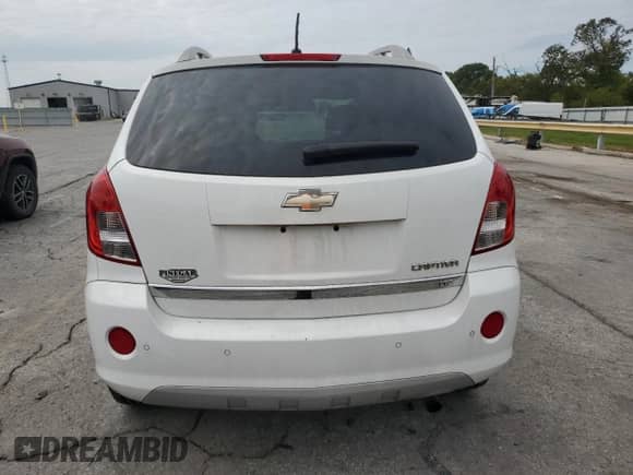 2014 Chevrolet Captiva Sport LTZ with VIN 3GNAL4EK5ES629435, listed as a Copart auction lot 82458595 with 119,160 mi miles and Salvage title. Bid and sale history available at DreamBid. Image 6.