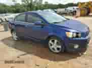 2014 Chevrolet Sonic LTZ with VIN 1G1JE5SB6E4216459, listed as a Copart auction lot 82163015 with 122,912 mi miles and Clean title. Bid and sale history available at DreamBid. Image 4.