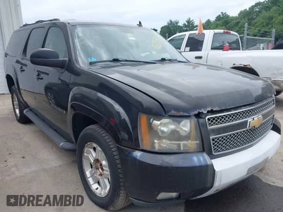 2011 Chevrolet Suburban LT z VIN 1GNSKJE31BR233032, wystawiony jako IAAI lot #42758398 z przebiegiem 167 514 mil mil oraz . Historia ofert i sprzedaży dostępna na DreamBid. Obrazek 1.