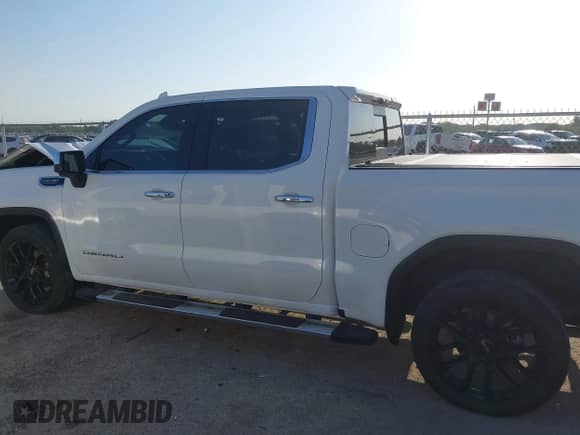 2023 GMC Sierra 1500 Denali z VIN 3GTUUGED4PG345211, wystawiony jako IAAI lot #42995625 z przebiegiem 63 396 mil mil oraz . Historia ofert i sprzedaży dostępna na DreamBid. Obrazek 14.