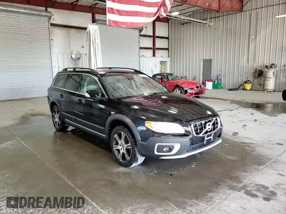 2013 Volvo XC70 T6 с VIN YV4902BZ2D1158951, выставлен на аукционе Copart как лот 70481085 с пробегом 195 948 миль миль и Списание • Salvage title. История ставок и продаж доступна на DreamBid. Изображение 13.