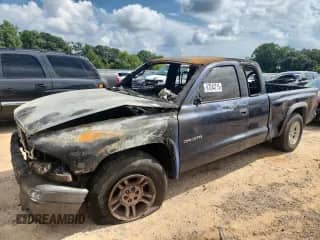 2002 Dodge Dakota z VIN 1B7GL12X52S663173, wystawiony jako Copart lot #67244715 z przebiegiem Nie podano mil oraz Szkoda całkowita • Salvage title. Historia ofert i sprzedaży dostępna na DreamBid. Obrazek 1.