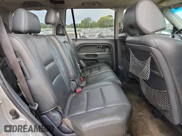 2006 Honda Pilot EX-L z VIN 5FNYF18616B015259, wystawiony jako Copart lot #70057865 z przebiegiem 194 719 mil mil oraz Szkoda całkowita • Salvage title. Historia ofert i sprzedaży dostępna na DreamBid. Obrazek 11.