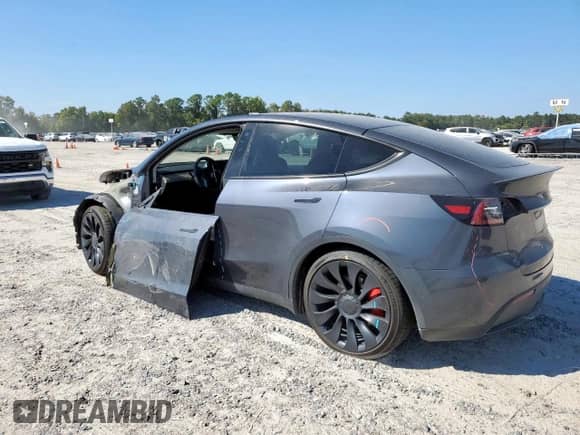 2022 Tesla Model Y Performance z VIN 7SAYGDEF3NF443970, wystawiony jako Copart lot #85561825 z przebiegiem 19 750 mil mil oraz Szkoda całkowita • Salvage title. Historia ofert i sprzedaży dostępna na DreamBid. Obrazek 2.