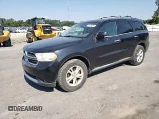2013 Dodge Durango Crew with VIN 1C4RDJDG1DC700722, listed as a Copart auction lot 71443295 with 172,283 mi miles and Salvage title. Bid and sale history available at DreamBid. Image 1.