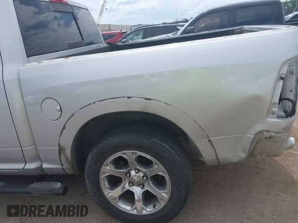 2014 Ram 1500 Laramie with VIN 1C6RR6NT0ES122640, listed as a IAAI auction lot 42638561 with 129,878 mi miles and . Bid and sale history available at DreamBid. Image 6.