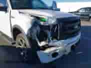 2014 Ford F-150 XLT with VIN 1FTFW1EF8EKE96026, listed as a IAAI auction lot 43410651 with 208,712 mi miles and . Bid and sale history available at DreamBid. Image 6.