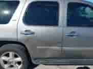 2007 Chevrolet Tahoe LTZ with VIN 1GNFC13J97R155705, listed as a IAAI auction lot 40914171 with 165,727 mi miles and . Bid and sale history available at DreamBid. Image 13.