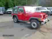 2000 Jeep Wrangler SE with VIN 1J4FA29P8YP711686, listed as a Copart auction lot 68999455 with 100,108 mi miles and Salvage title. Bid and sale history available at DreamBid. Image 14.