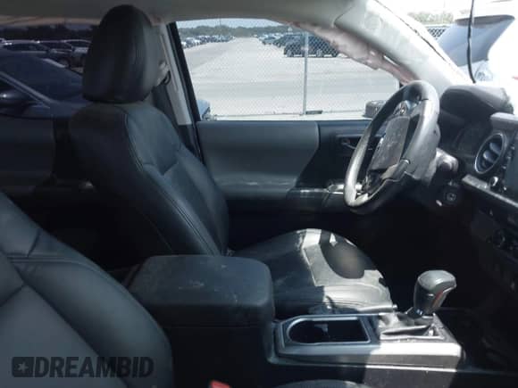 2021 Toyota Tacoma SR5 with VIN 5TFAZ5CN1MX118036, listed as a IAAI auction lot 42840652 with 73,082 mi miles and . Bid and sale history available at DreamBid. Image 5.
