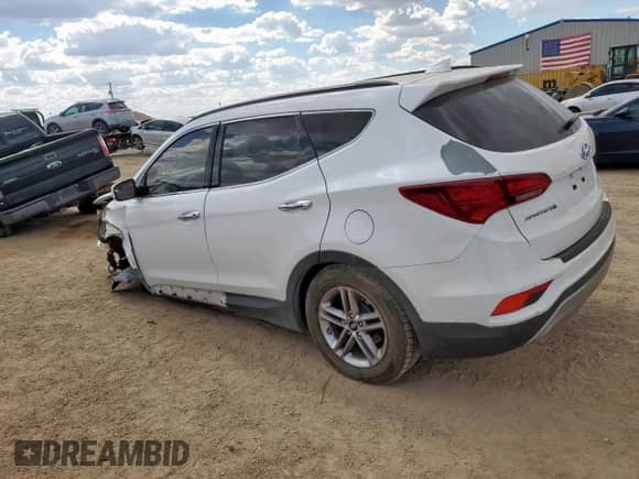 2017 Hyundai Santa Fe 2.4L с VIN 5NMZU3LB1HH015256, выставлен на аукционе Copart как лот 82183125 с пробегом Не указан миль и Списание • Salvage title. История ставок и продаж доступна на DreamBid. Изображение 2.