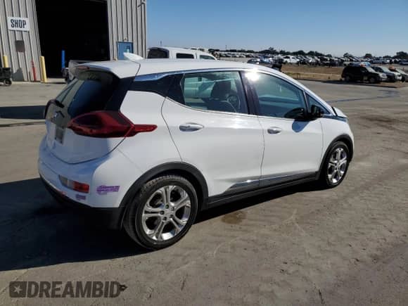 2018 Chevrolet Bolt EV LT с VIN 1G1FW6S01J4141171, выставлен на аукционе Copart как лот 80760075 с пробегом Не указан миль и Списание • Salvage title. История ставок и продаж доступна на DreamBid. Изображение 3.