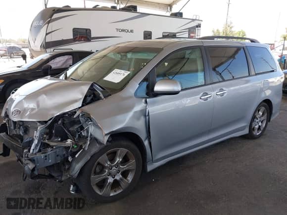 2014 Toyota Sienna SE with VIN 5TDXK3DC8ES485443, listed as a IAAI auction lot 42685176 with 91,853 mi miles and . Bid and sale history available at DreamBid. Image 2.