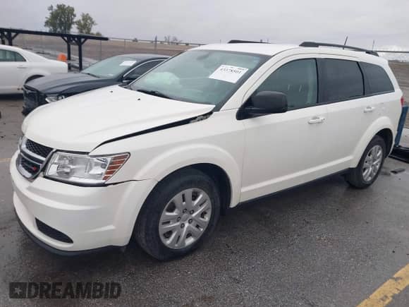 2019 Dodge Journey SE Value with VIN 3C4PDCAB8KT797348, listed as a IAAI auction lot 43378501 with 93,026 mi miles and . Bid and sale history available at DreamBid. Image 2.