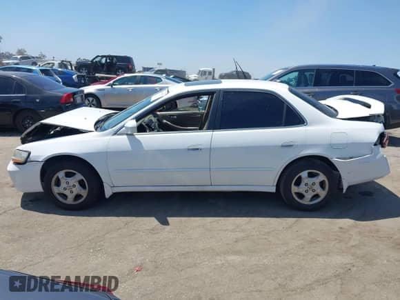1999 Honda Accord EX with VIN 1HGCG6679XA059196, listed as a IAAI auction lot 43042767 with 256,679 mi miles and . Bid and sale history available at DreamBid. Image 14.