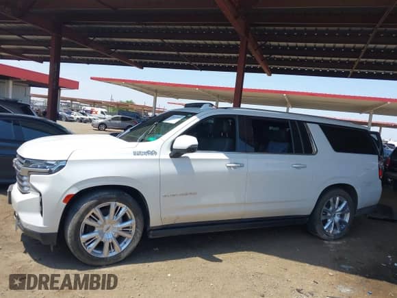 2021 Chevrolet Suburban High Country z VIN 1GNSCGKL3MR190496, wystawiony jako IAAI lot #39935508 z przebiegiem Nie podano mil oraz . Historia ofert i sprzedaży dostępna na DreamBid. Obrazek 13.