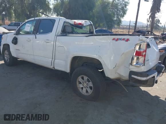 2020 Chevrolet Colorado 4WD Work Truck with VIN 1GCGTBEN2L1223483, listed as a IAAI auction lot 41339810 with 75,696 mi miles and . Bid and sale history available at DreamBid. Image 3.