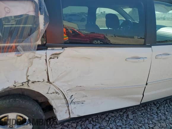 2010 Dodge Grand Caravan Hero z VIN 2D4RN3D10AR419845, wystawiony jako Copart lot #72013805 z przebiegiem 185 929 mil mil oraz Szkoda całkowita • Salvage title. Historia ofert i sprzedaży dostępna na DreamBid. Obrazek 11.