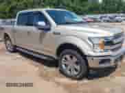 2018 Ford F-150 Lariat with VIN 1FTEW1E55JKD04719, listed as a IAAI auction lot 42972365 with 240,132 mi miles and . Bid and sale history available at DreamBid. Image 1.