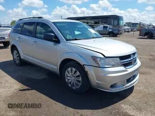 2014 Dodge Journey American Value with VIN 3C4PDCAB9ET210515, listed as a IAAI auction lot 43067776 with 166,251 mi miles and . Bid and sale history available at DreamBid. Image 1.
