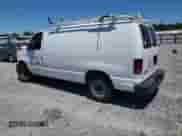 2009 Ford Econoline Cargo Commercial с VIN 1FTNE14W99DA93361, выставлен на аукционе Copart как лот 61009574 с пробегом 299 496 миль миль и Списание • Salvage title. История ставок и продаж доступна на DreamBid. Изображение 2.