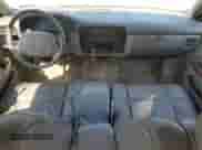 1994 Chevrolet Caprice с VIN 1G1BN52W0RR108855, выставлен на аукционе Copart как лот 70860985 с пробегом 124 554 миль миль и Списание • Salvage title. История ставок и продаж доступна на DreamBid. Изображение 8.