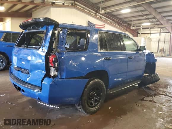 2020 Chevrolet Tahoe Commercial with VIN 1GNSKDEC9LR247733, listed as a Copart auction lot 81214625 with 73,557 mi miles and Salvage title. Bid and sale history available at DreamBid. Image 3.