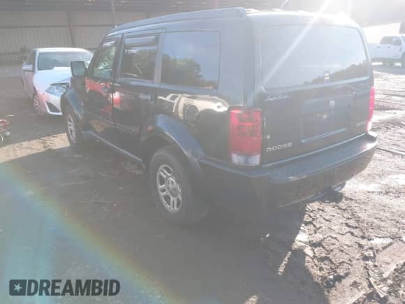 2009 Dodge Nitro SE with VIN 1D8GT28KX9W518412, listed as a IAAI auction lot 41458414 with 178,308 mi miles and . Bid and sale history available at DreamBid. Image 3.