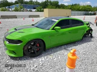 2017 Dodge Charger SRT Hellcat with VIN 2C3CDXL97HH592870, listed as a Copart auction lot 56943505 with 84,853 mi miles and Salvage title. Bid and sale history available at DreamBid. Image 1.
