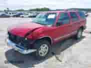 1999 Chevrolet Blazer LS with VIN 1GNDT13W0X2222414, listed as a IAAI auction lot 42936576 with 276,754 mi miles and . Bid and sale history available at DreamBid. Image 2.