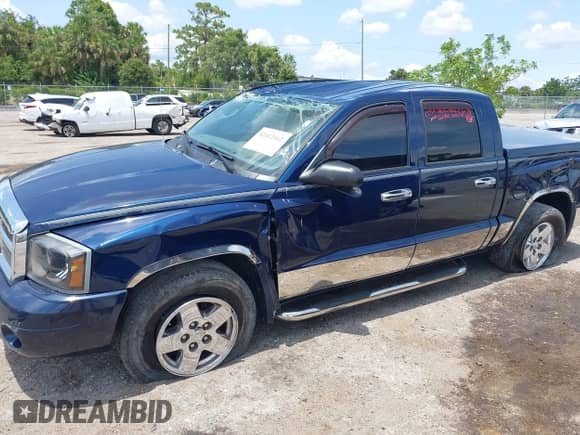 2006 Dodge Dakota SLT with VIN 1D7HE48K96S503482, listed as a IAAI auction lot 42412162 with 127,360 mi miles and . Bid and sale history available at DreamBid. Image 6.