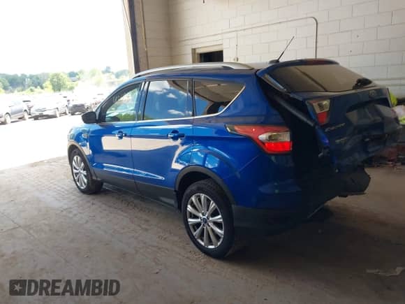 2017 Ford Escape Titanium with VIN 1FMCU9JD3HUA48471, listed as a IAAI auction lot 42686659 with 101,782 mi miles and . Bid and sale history available at DreamBid. Image 3.