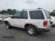 2000 Ford Explorer Sport with VIN 1FMYU60E6YUA45451, listed as a Copart auction lot 59874285 with 199,053 mi miles and Salvage title. Bid and sale history available at DreamBid. Image 2.