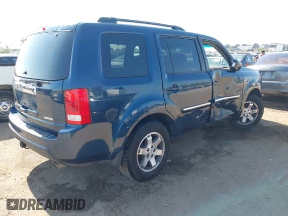 2009 Honda Pilot Touring with VIN 5FNYF38839B003759, listed as a IAAI auction lot 42594357 with 208,297 mi miles and . Bid and sale history available at DreamBid. Image 4.