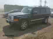 2007 Jeep Commander Limited with VIN 1J8HG58P27C520330, listed as a Copart auction lot 54595745 with 168,908 mi miles and Salvage title. Bid and sale history available at DreamBid. Image 14.