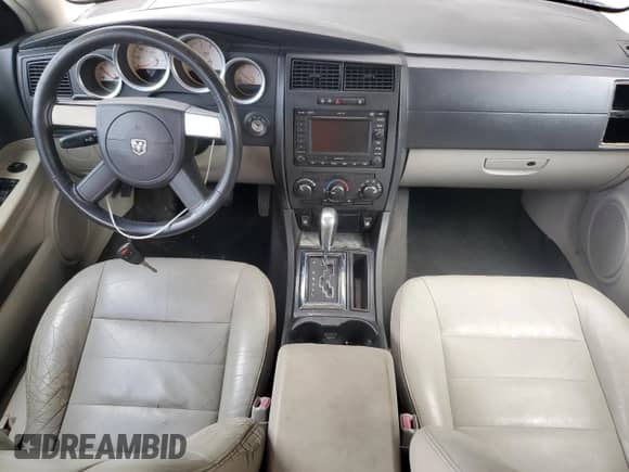 2005 Dodge Magnum SE с VIN 2D8FV48V45H169378, выставлен на аукционе Copart как лот 79414894 с пробегом 166 008 миль миль и Списание • Salvage title. История ставок и продаж доступна на DreamBid. Изображение 8.