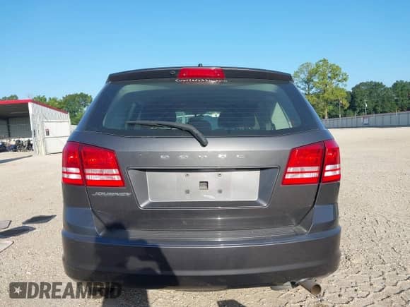 2015 Dodge Journey American Value z VIN 3C4PDCAB5FT559219, wystawiony jako IAAI lot #42852010 z przebiegiem 58 773 mil mil oraz . Historia ofert i sprzedaży dostępna na DreamBid. Obrazek 16.