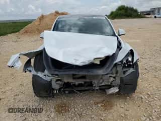 2023 Tesla Model Y Long Range with VIN 7SAYGDEE8PA067712, listed as a Copart auction lot 63824464 with 30,863 mi miles and Salvage title. Bid and sale history available at DreamBid. Image 5.