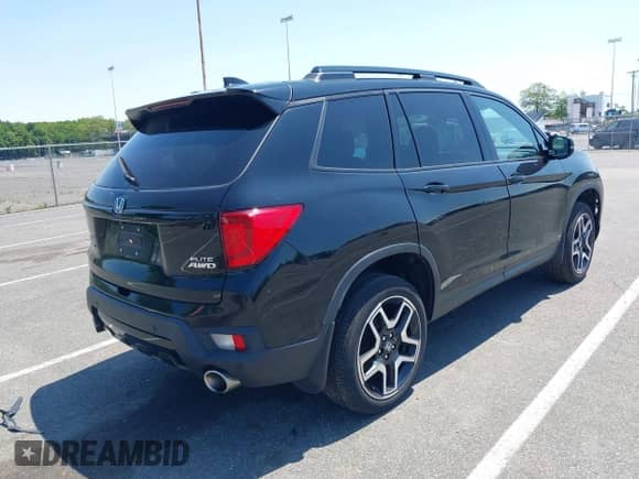 2022 Honda Passport Elite with VIN 5FNYF8H00NB004126, listed as a IAAI auction lot 42401773 with 32,012 mi miles and . Bid and sale history available at DreamBid. Image 4.