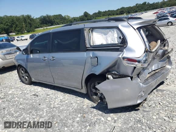 2012 Toyota Sienna SE with VIN 5TDXK3DC9CS183950, listed as a Copart auction lot 70873765 with 180,359 mi miles and Salvage title. Bid and sale history available at DreamBid. Image 2.