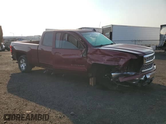 2015 Chevrolet Silverado 1500 LT with VIN 1GCUKRECXFF200151, listed as a Copart auction lot 81478855 with 136,847 mi miles and Salvage title. Bid and sale history available at DreamBid. Image 4.