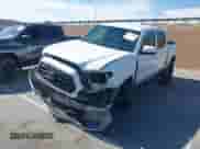 2021 Toyota Tacoma TRD Off Road с VIN 3TMCZ5AN5MM445069, выставлен на аукционе IAAI как лот 42933964 с пробегом 104 365 миль миль и . История ставок и продаж доступна на DreamBid. Изображение 2.
