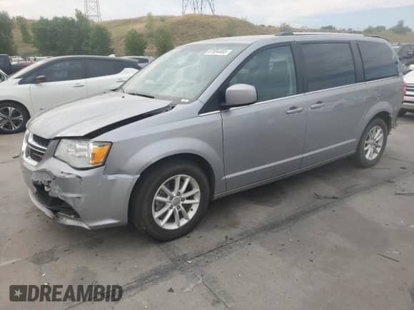 2018 Dodge Grand Caravan SXT with VIN 2C4RDGCG7JR265096, listed as a Copart auction lot 67654465 with 142,250 mi miles and Salvage title. Bid and sale history available at DreamBid. Image 1.